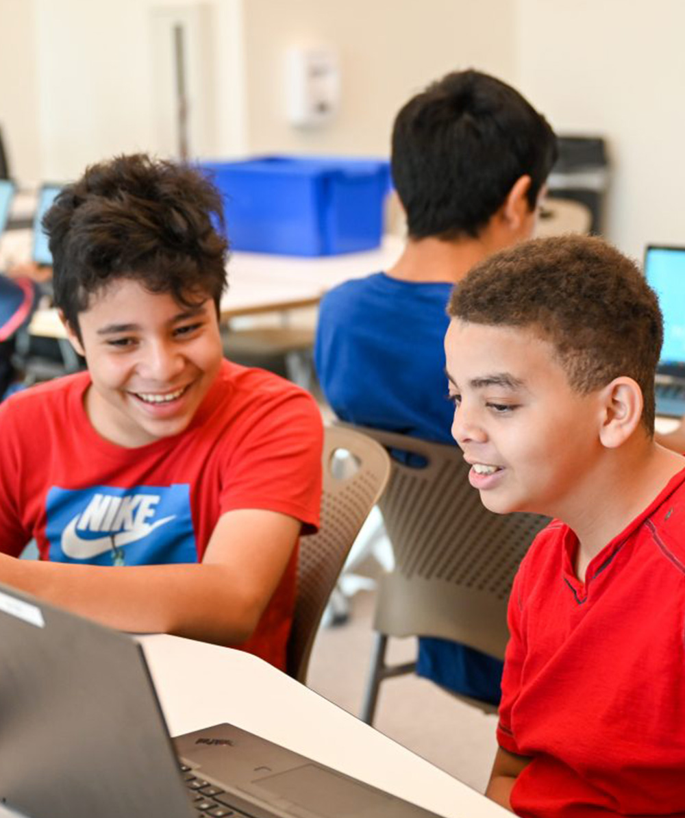 Students Working Together On The Computer